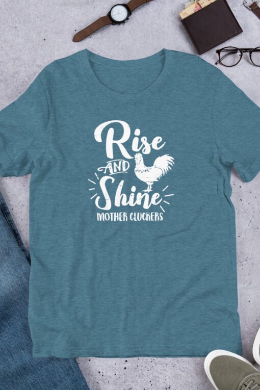 Heather Deep Teal 'Rise and Shine Mother Cluckers' unisex T-shirt – funny chicken tee with rooster design, perfect for backyard poultry lovers and farmhouse humor fans.
