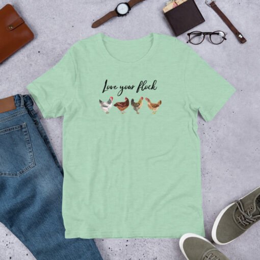 Heather Prism Mint 'Love Your Flock' unisex T-shirt – light green chicken-themed shirt with cute heart and hen design, ideal for poultry enthusiasts and farm life fans.