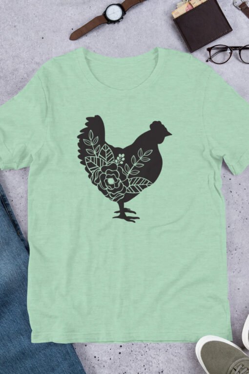 Heather Prism Mint Floral Chicken T-shirt – light green unisex tee with boho floral chicken design, ideal for homesteaders and coop keepers.