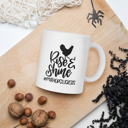 11 oz Rise and Shine Mothercluckers coffee mug – funny ceramic mug with playful chicken design, perfect gift for poultry lovers and farm enthusiasts.