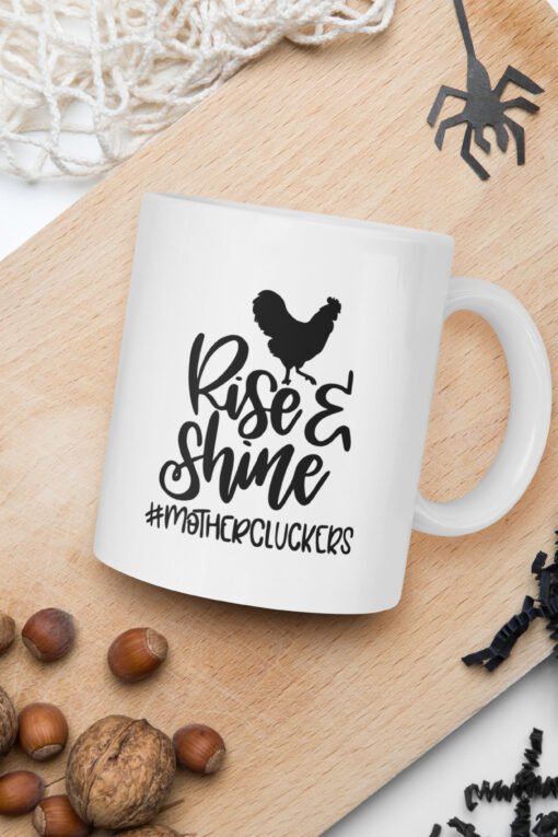 11 oz Rise and Shine Mothercluckers coffee mug – funny ceramic mug with playful chicken design, perfect gift for poultry lovers and farm enthusiasts.