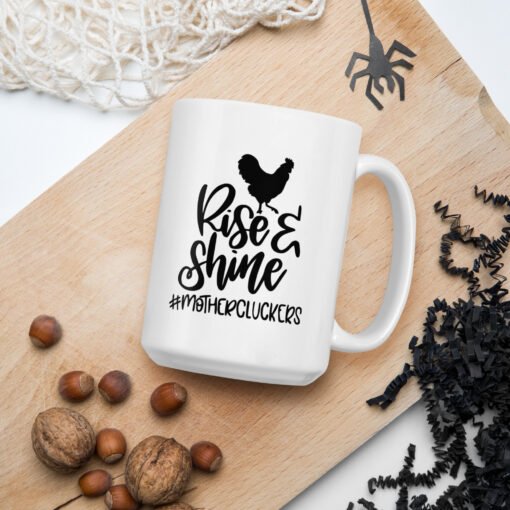 15 oz Rise and Shine Mothercluckers coffee mug – large ceramic mug featuring cheeky chicken graphic, ideal for backyard flock keepers and chicken fans.